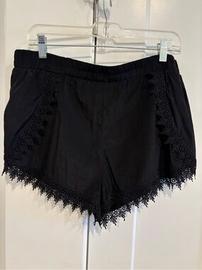 Revolution Black Elastic-Waist Shorts with Yellow Brand Tag